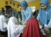 Bersama Ketua TP-PKK, Pj Walikota Lakukan Uji Coba Makan Bergizi Gratis di Wilayah Telluwanua